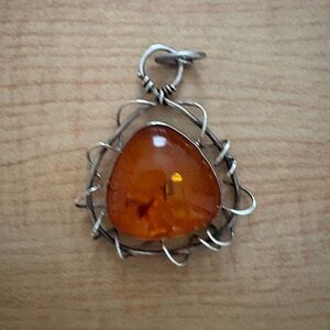 Elegant Amber Pendant with Silver Wire Wrap